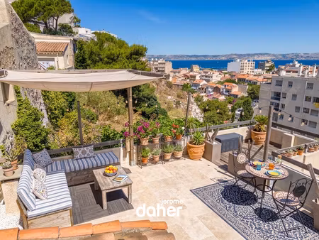 maison avec roof top et vue mer