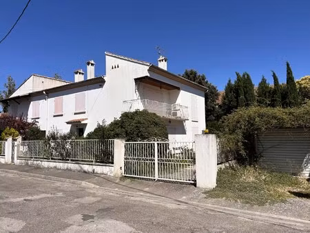 ensemble immobilier avec jardin et garages centre ville exclusivité