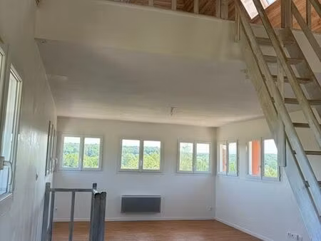 idéal jeune couple ou investisseur  loft atypique avec 2 parkings dans environnement excep