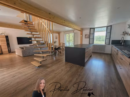 maison familiale avec pièce de vie de 58 m²  véranda  garage et terrain de 998 m²