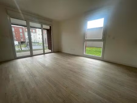 t3 avec jardin  terrasse et parking à valenciennes
