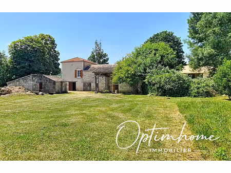 ensemble immobilier en pierres avec dépendances