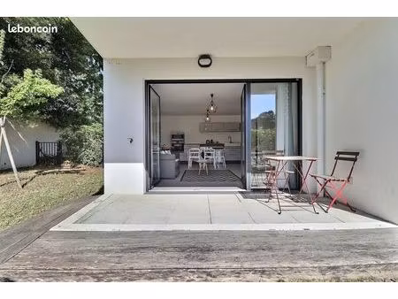 appartement avec jardin de 100m² et 2 places de parking