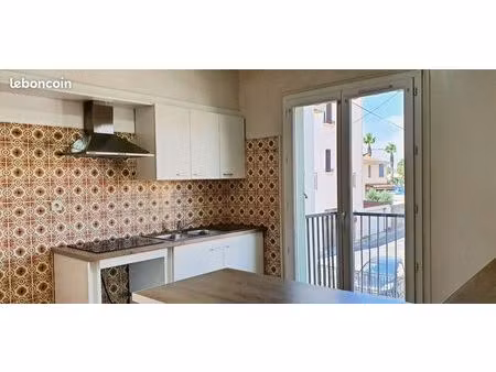 t4 traversant de 88 m2 avec garage et balcons