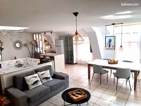 appartement 4 pièces de 102m2  avec cave et garage