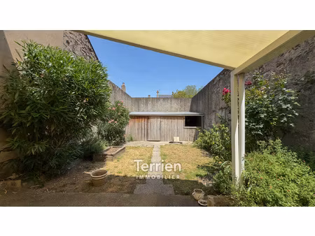 appartement spacieux avec jardin et garage