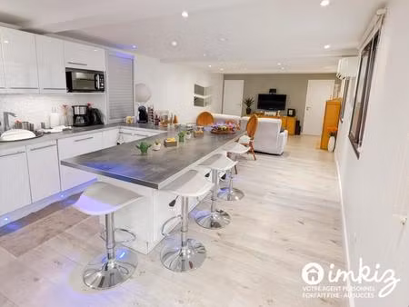 rare écusson : 61m² + terrasse