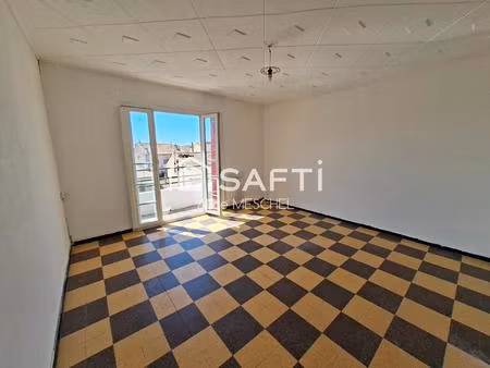 un appartement t4 -cave- balcon -terrasse-