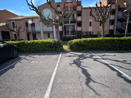 place de parking au sein d'une résidence sécurisée