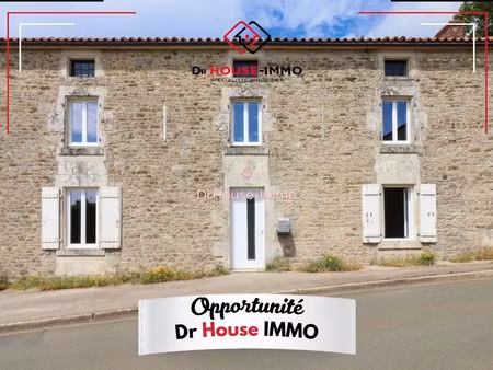 maison en pierre  4 chambres  un garage  sur terrain de plus de 600m2