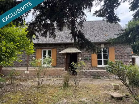 maison en briques avec une dépendance