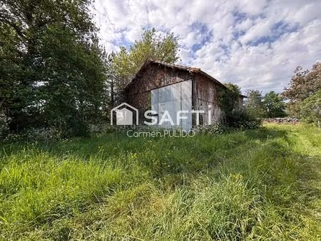 ancien séchoir à tabac à rénover avec terrain constructible