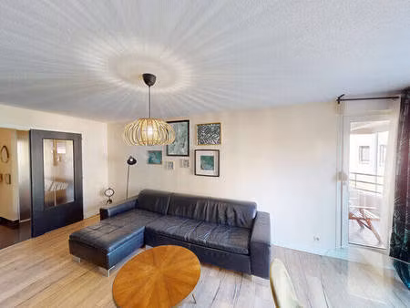 appartement 3 pièces de 64 m² avec terrasse et garage à strasbourg