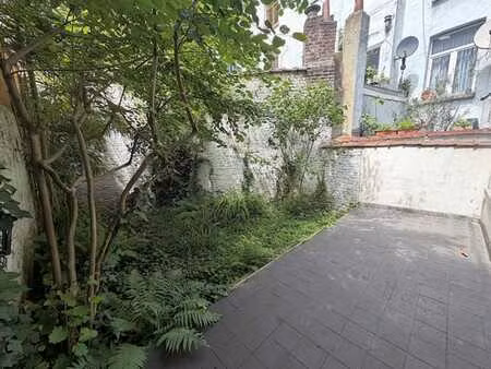 porte de hal / bel appartement r-d-c de 95m²  2ch  jardin