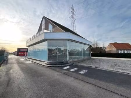 showroom met woonst te koop