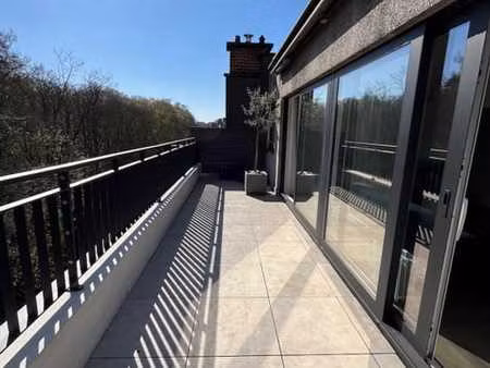 penthouse d'exception face au bois de la cambre