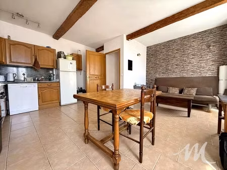appartements et garage dans maison de village