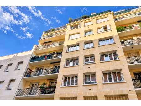 bel appartement traversant au 6e étage avec balcon ensoleill