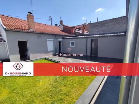 ensemble de 2 maisons (dont 1 plain pied) avec garage et jardin