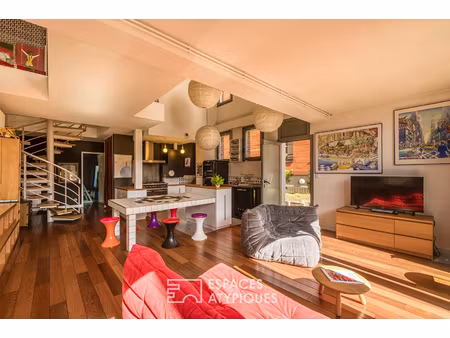 loft duplex avec loggia et jardin  dans un ancien batiment portuaire
