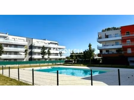 appartement rez-de-chaussée avec jardin et terrasse - résidence avec piscine