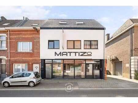 erg ruime kwalitatief verhuurde handelswoning + grond of ...