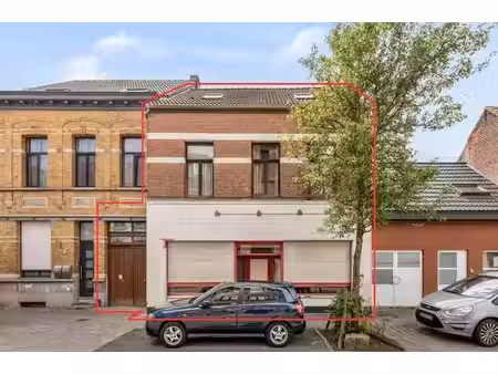woonhuis met commerciële ruimte en tuin