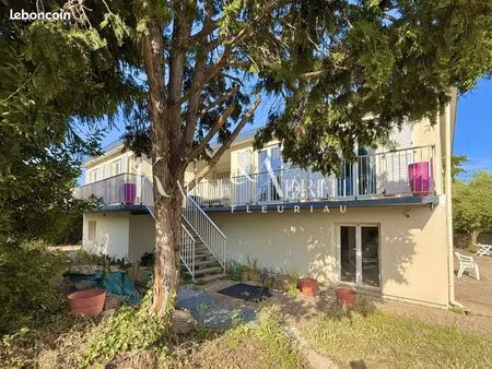 maison 9 pièces 211 m²