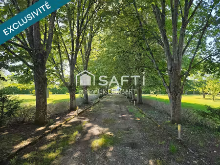 parcelle divisible de 2 hectares (7 lots) avec propriété de caractère en pierre à 10 minut