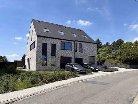 'kwadraat' woning met tuin en inpandige garage te haasrode!