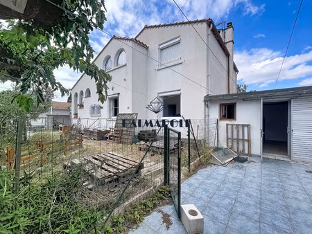 canet maison de ville composée de 3 appartements plus garage