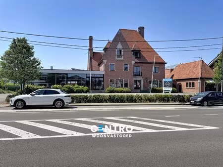 commerciële site met woonst op toplocatie te roeselare!
