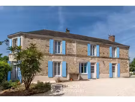 grande maison bourgeoise et son jardin secret : élégance et authenticité