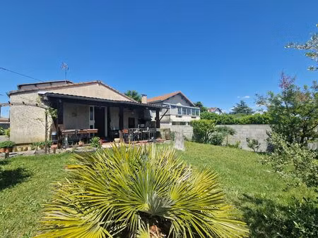 belle maison familiale de 7 pièces avec jardin arboré et garage à romans-sur-isère