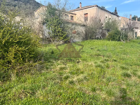 maison à remettre au gout du jour avec terrain de 1000 m² environ