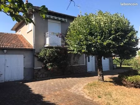 maison individuelle avec garage et terrain clos
