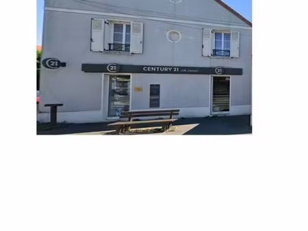 murs local commercial loué a vendre