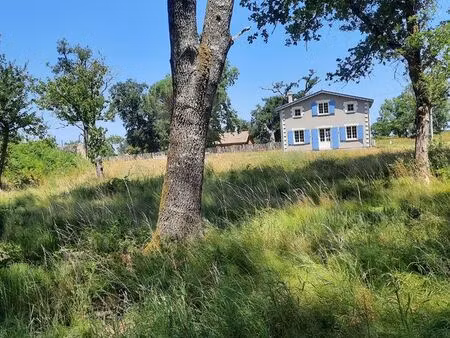 maison neuve re2020 de 140m2 située au calme sur un grand terrain boisé de plus d'un ha