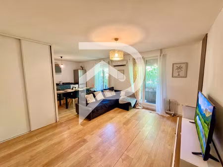 bel appartement de 65m2 - immeuble récent - parking