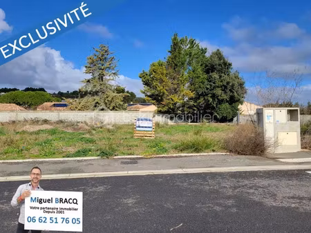 vente terrain 390 m² à lespignan (34710)  102 000 €