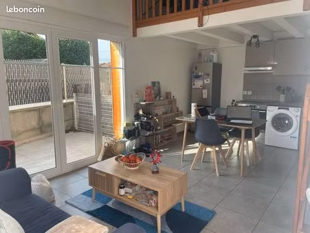 t2 avec mezzanine et jardin cloturé