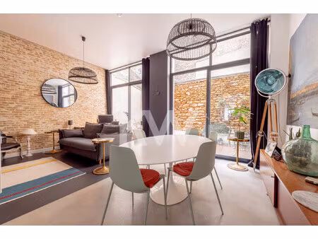 loft traversant avec terrasse de plein pied