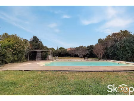 vente terrain hors lotissement d'environ 750 m2 avec piscine