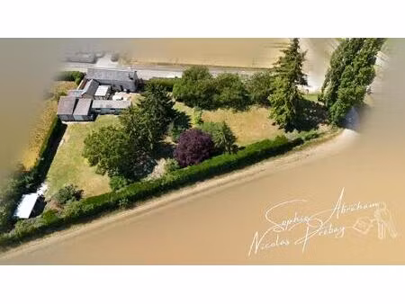 maison avec dépendances et terrain constructible à toury