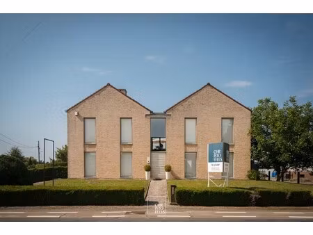 ruime woning in bilzen met veel woon- en werkmogelijkheden!