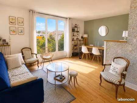 appartement 3 pièces de 61 5 m² – résidence arborée avec cave et parking