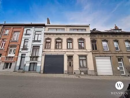 immeuble mixte - 4 logements + entrepôt 350²