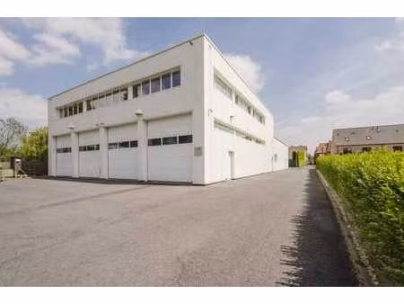 bâtiment commercial avec maison à lendelede