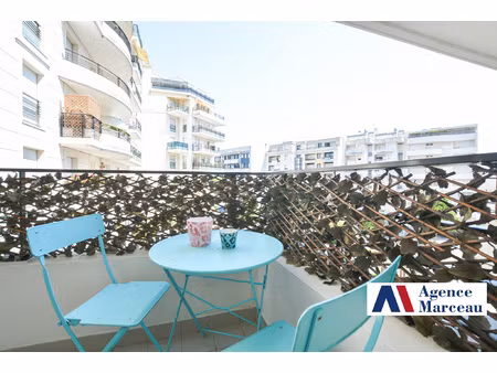 f2 avec terrasse+ cave et parking.