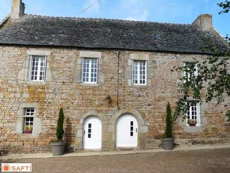 cette maison atypique  ancien moulin de 1710